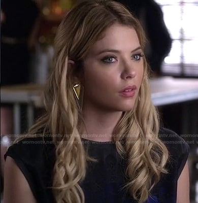 Hanna's blue and black sheer panel top and oversized triangle earrings on Pretty Little Liars