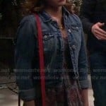 Keira’s printed dress with denim jacket and red purse on Melissa & Joey