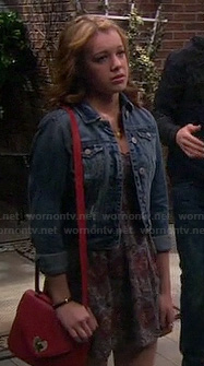 Keira's printed dress with denim jacket and red purse on Melissa & Joey