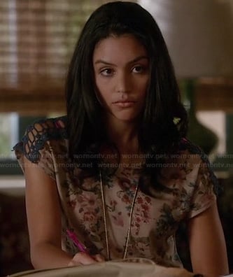Lexi’s floral tie front top with crochet sleeves on The Fosters