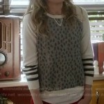 Polly’s grey sweater with white striped sleeves on How To Live With Your Parents