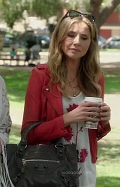 Polly's red leather jacket and grey purse on How to Live with Your Parents