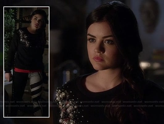 Aria's black and white stripe pattern jeans and pearl embellished top on Pretty Little Liars