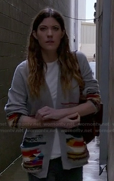 Debra’s grey and red patterned cardigan on Dexter