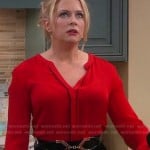 Mel’s red blouse with black piping on Melissa and Joey