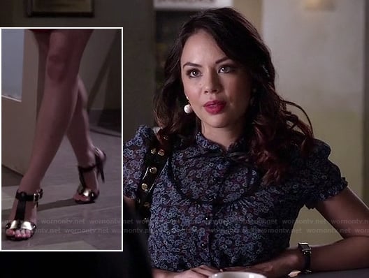 Mona's black and gold t-strap heels and floral button up top on Pretty Little Liars