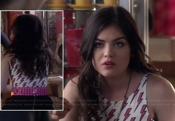 Aria's pink lightning print top and pink studded belt on Pretty Little Liars