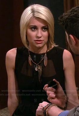 Riley’s black mesh panel dress and feather necklace on Baby Daddy