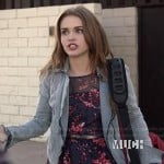 Lydia’s denim moto jacket and floral print dress on Teen Wolf