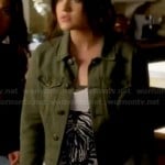 Aria’s zebra face top and army green jacket on Pretty Little Liars