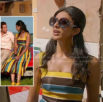 Divya's blue, yellow and black striped dress and round sunglasses on Royal Pains