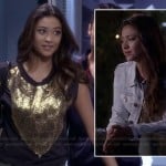 Emily’s black and gold foil tee, light wash denim jacket and striped bag on Pretty Little Liars