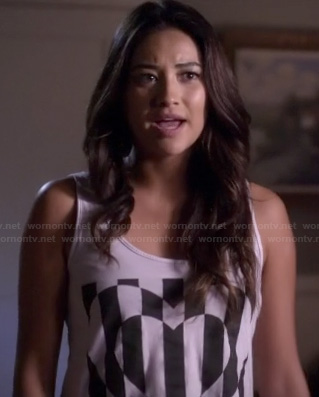 Emily’s white tank top with black striped heart graphic on Pretty Little Liars