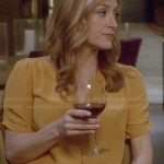 Maura’s yellow split neck blouse with ruched sleeves on Rizzoli and Isles