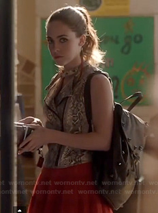 Phoebe’s snakeskin printed vest and black spiked backpack on Twisted