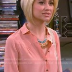 Riley’s peach orange half placket shirt on Baby Daddy