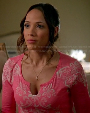 Rosie's pink and white printed split neck tee on Devious Maids