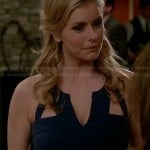 Taylor’s navy blue cutout dress at the dinner party on Devious Maids