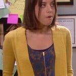 April’s printed zip front top and yellow cardigan on Parks and Recreation