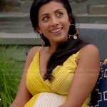 Divya’s yellow and white pleated dress on Royal Pains