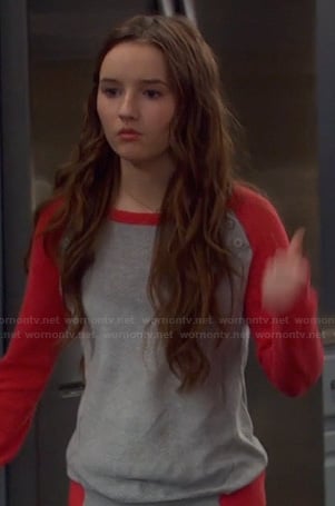 Eve's red and grey shoulder button baseball sweater on Last Man Standing