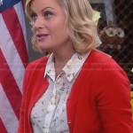 Leslie’s white printed shirt and red cardigan on Parks and Recreation