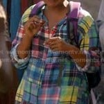 Mindy’s multi-colored patchwork plaid shirt in Haiti on The Mindy Project