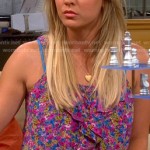 Penny’s pink and purple floral ruffle front top on The Big Bang Theory