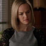 Robyn’s grey top with black lace sleeves on The Good Wife