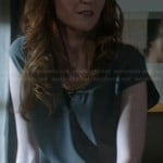 Abby’s grey split neck blouse on Scandal