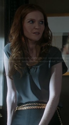 Abby’s grey split neck blouse on Scandal