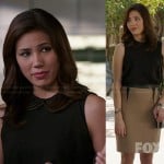 Angela’s beige skirt with leather triangle insets and black collared blouse on Bones