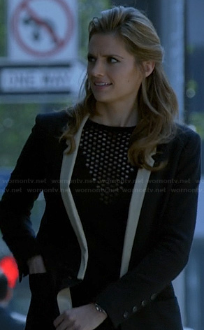 Beckett's black blazer with white lapel and triangle mesh inset top on Castle