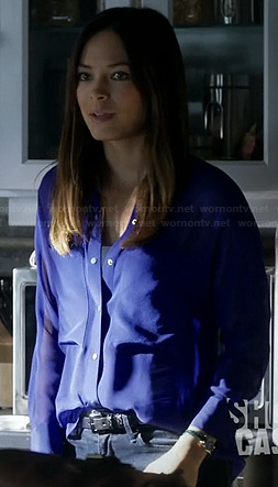 Cat's sheer blue button front blouse on Beauty and the Beast