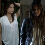 Cat’s white two-button blouse and tan leather jacket on Beauty and the Beast