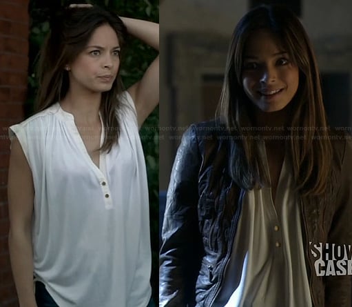 Cat's white two-button blouse and tan leather jacket on Beauty and the Beast