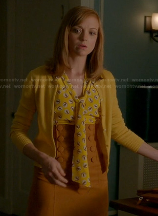 Emma's yellow printed bow front blouse and high waisted button detail pencil skirt on Glee