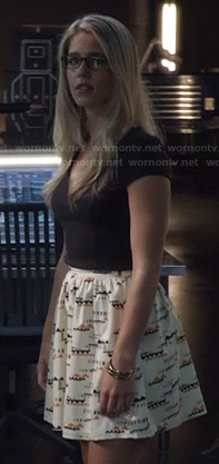 Felicity’s flared and patterned skirt and black top on Arrow