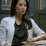 Joan’s black line-graphic tee on Elementary