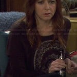 Lily’s black circle graphic sweater on How I Met Your Mother