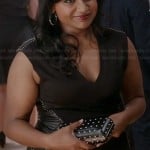 Mindy’s black dress with studded leather side panels and studded clutch on The Mindy Project