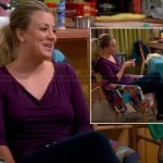 Penny’s purple cowl neck top and purple/pink tassel loafers on The Big Bang Theory