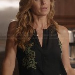 Rayna’s black and green printed blouse on Nashville