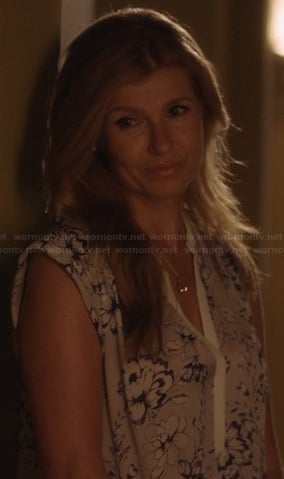 Rayna’s grey flower print blouse with white trim on Nashville