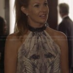 Rayna’s sketch print halter top on Nashville