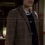 Remy’s blue polka dot sweater and check print blazer on Ravenswood