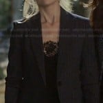 Sydney’s black lace cami and dark pinstripe blazer on The Crazy Ones