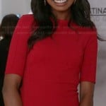 Tamra’s red elbow-sleeved dress on The Mindy Project