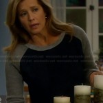 Vanessa’s navy sweater with grey sleeves on Last Man Standing