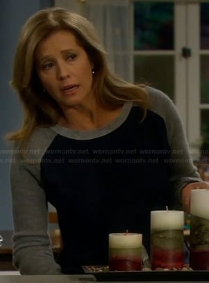 Vanessa's navy sweater with grey sleeves on Last Man Standing